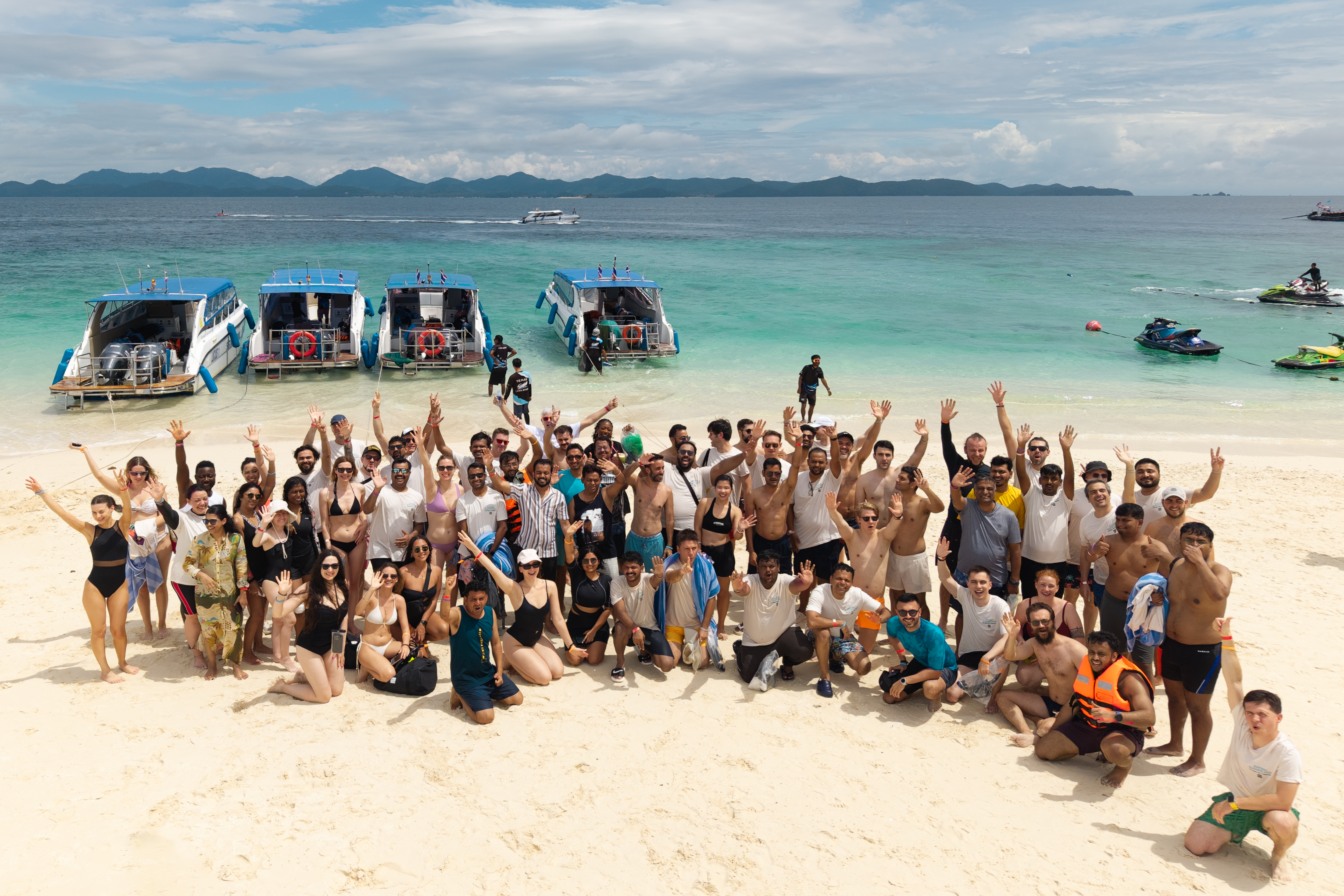 Team photo at a beach in Rai Island